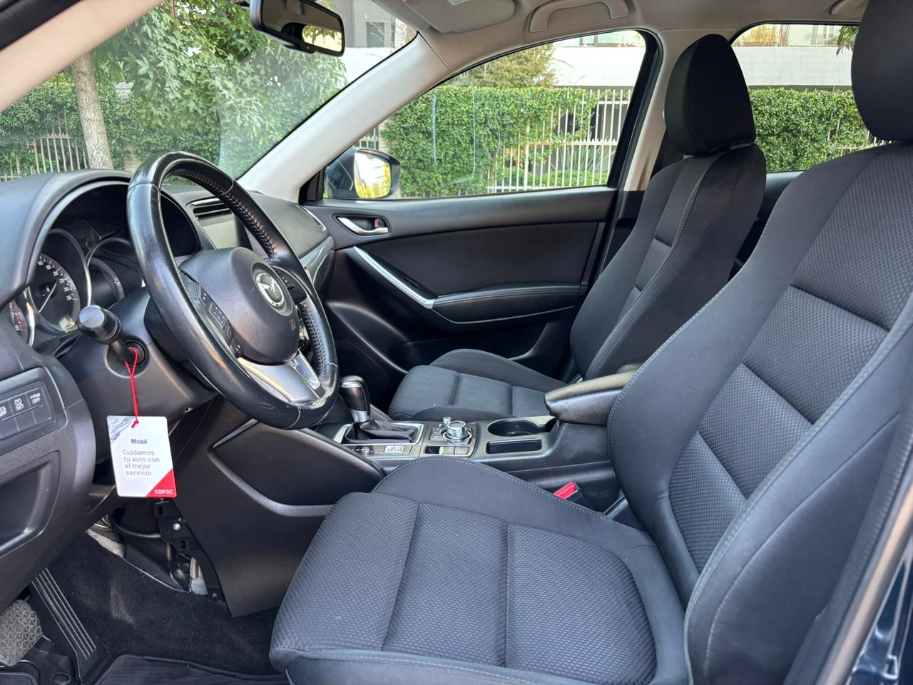 Interior Mazda CX-5 2016 panel central y climatizador bi-zona